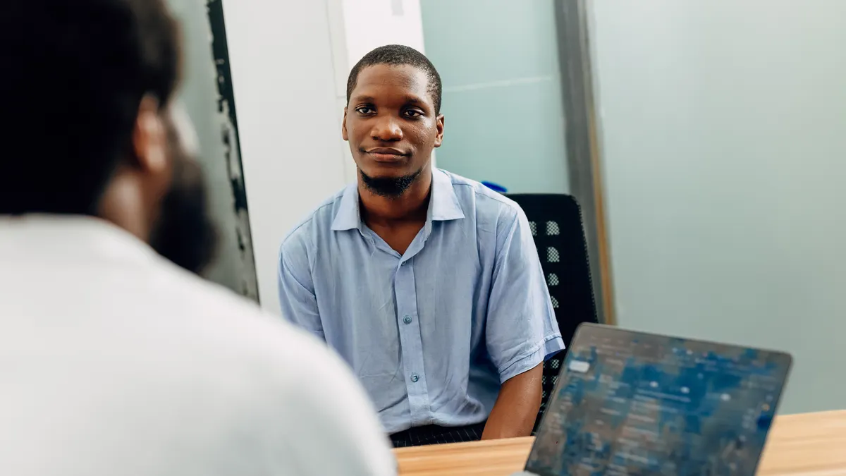 Candidate attending a professional interview in a Lagos office