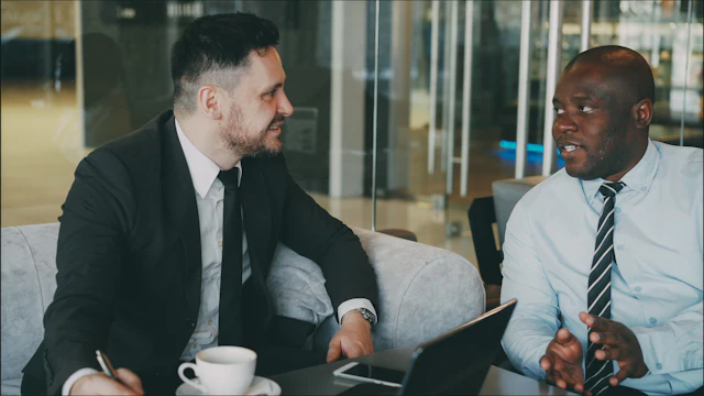 Sales consultant discussing a proposal with a business client